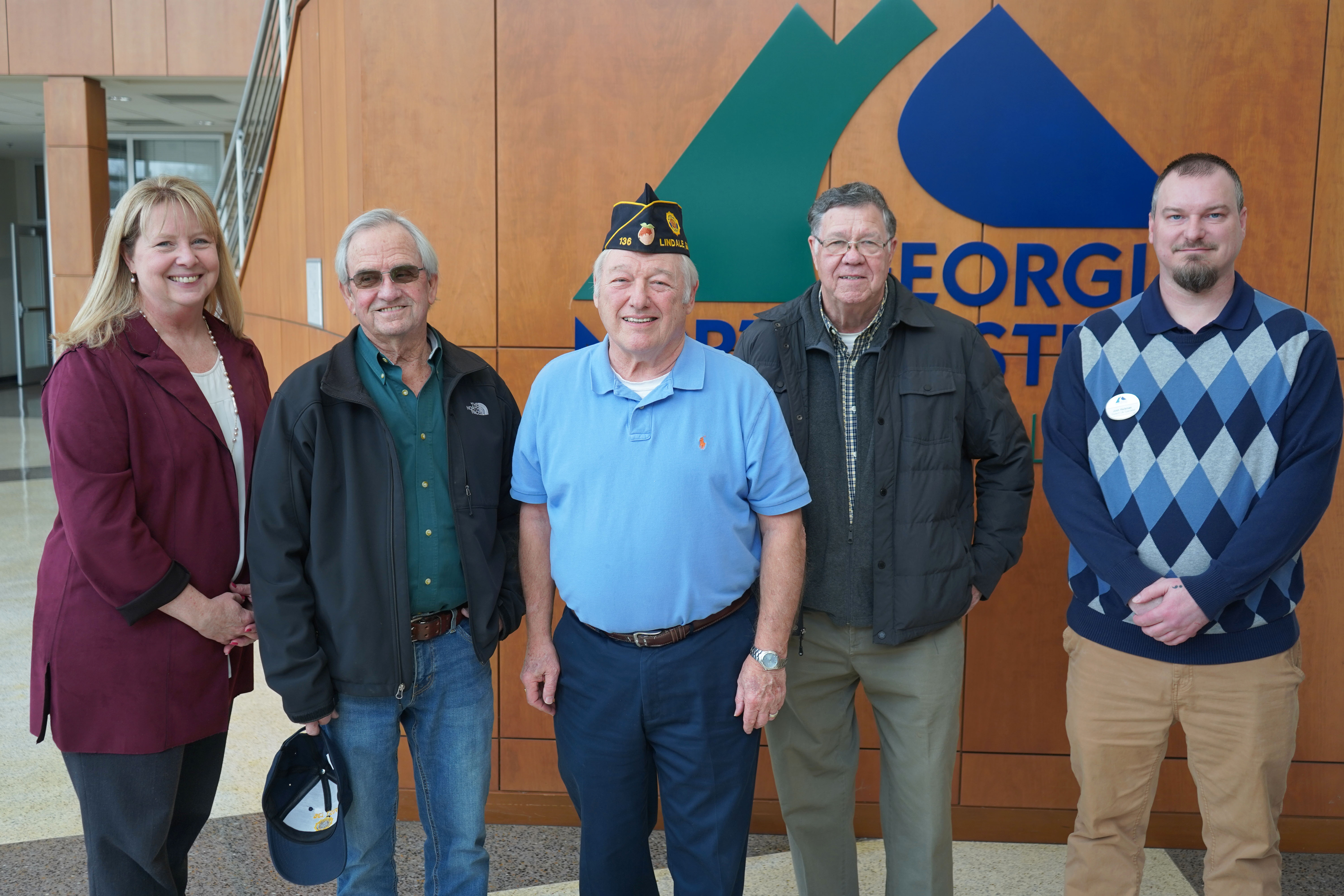 (From left) Dr. Heidi Popham, president of GNTC; David Cargill, former specialist fifth class in the U.S. Army; Ron Pajor, finance officer of Lindale Post 136 American Legion and former specialist fifth class in the U.S. Army; James Cox, former buck sergeant E5 in the U.S. Army and Josh Hickman, Student Life specialist at GNTC and former sergeant in the U.S. Air Force. Cargill is vice commander of Lindale Post 136, and Cox is past commander.