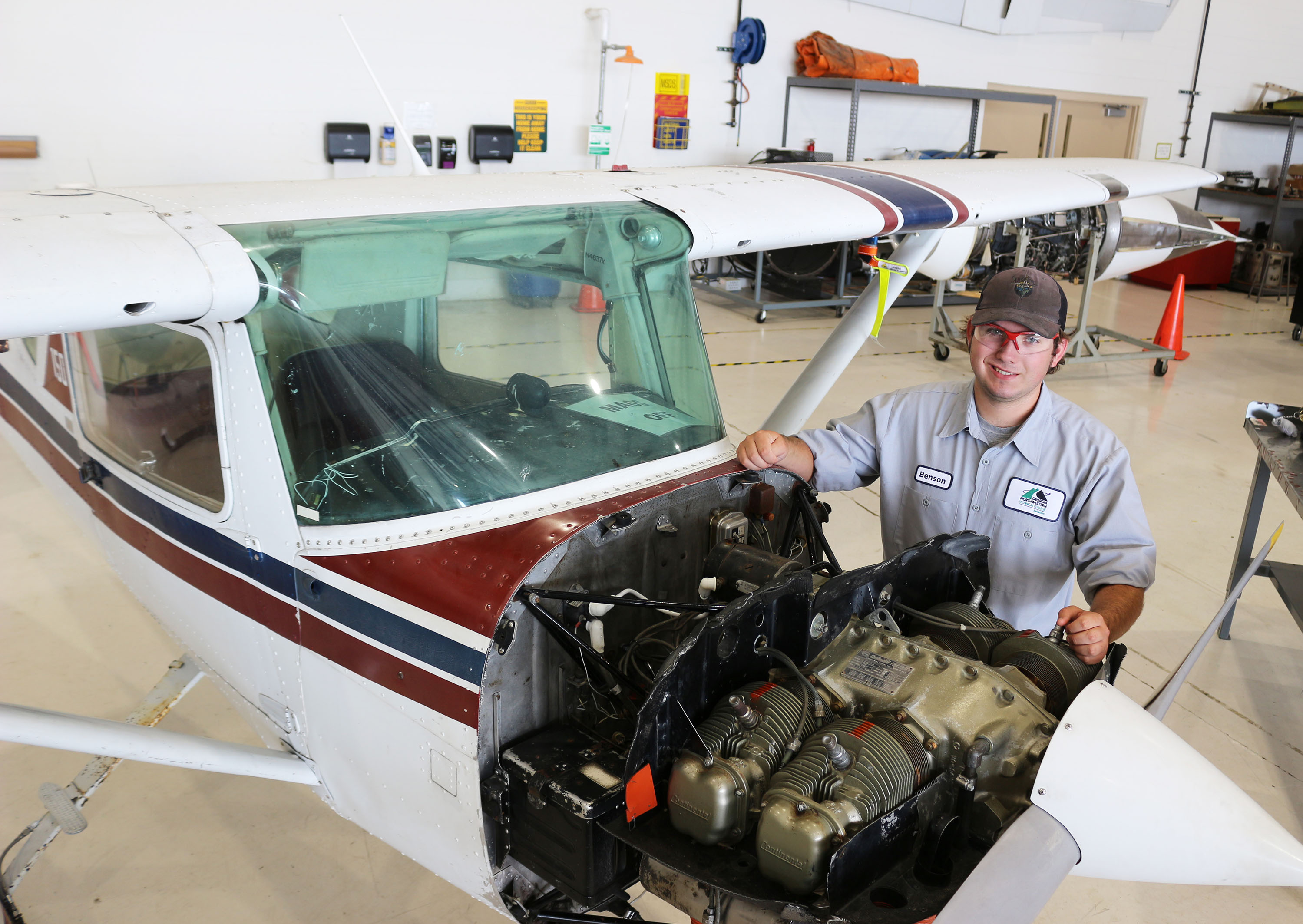 Benson Milam inspects the Cessna 150 at GNTC’s Aviation Training Center at the Richard B. Russell Regional Airport in Rome.