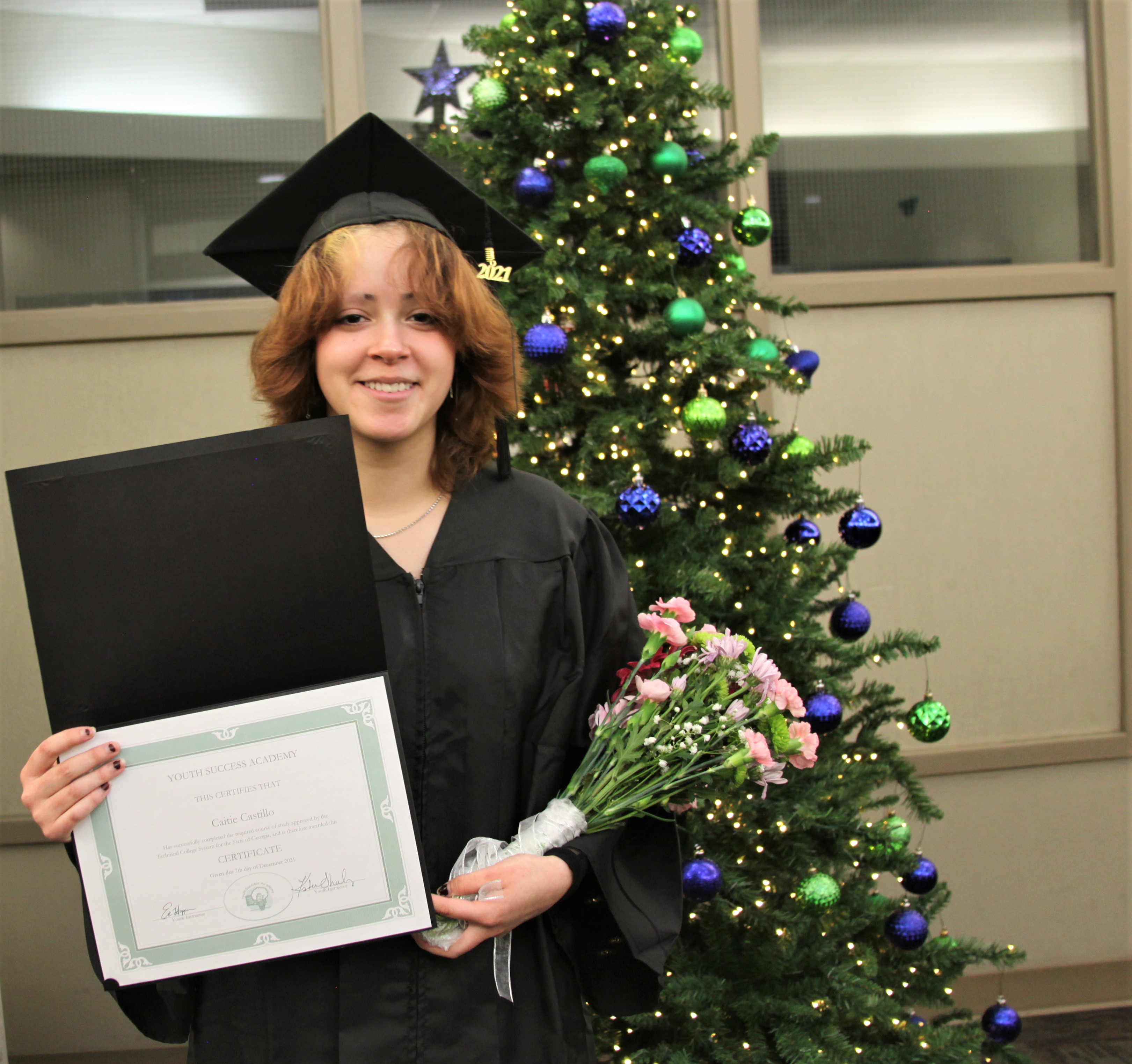 YSA graduate Caite Castillo, of Rome, moments after receiving her GED® diploma on Tuesday, Dec. 7, at GNTC’s Floyd County Campus. 