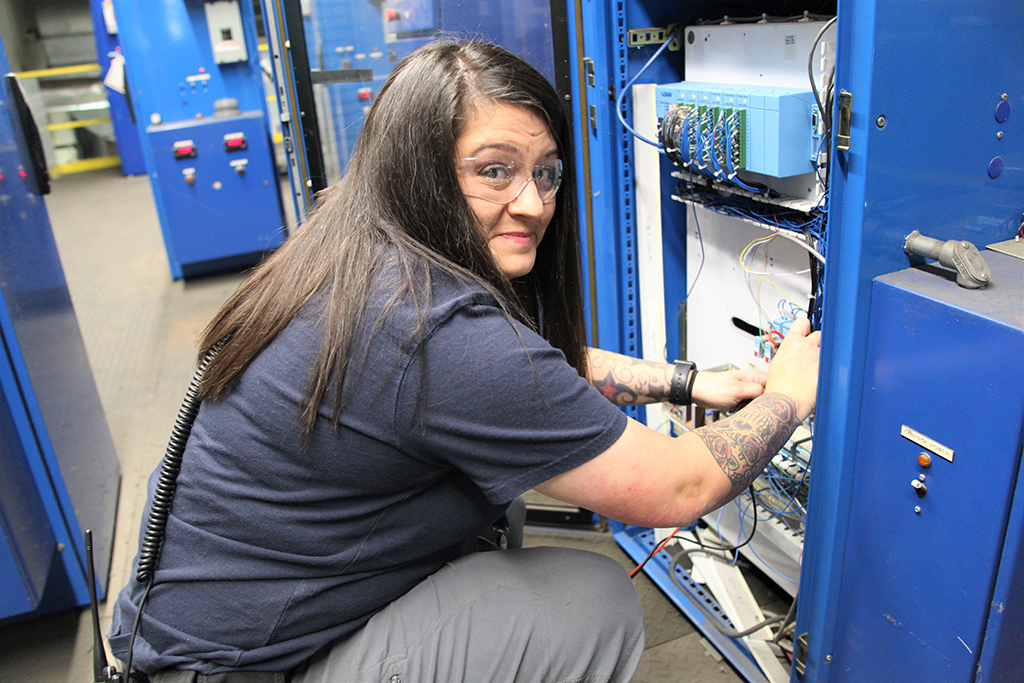 GNTC student Renee Robertson works on an electrical box at Roper Corporation. Robertson will be the first female to complete GNTC’s apprenticeship program with Roper
