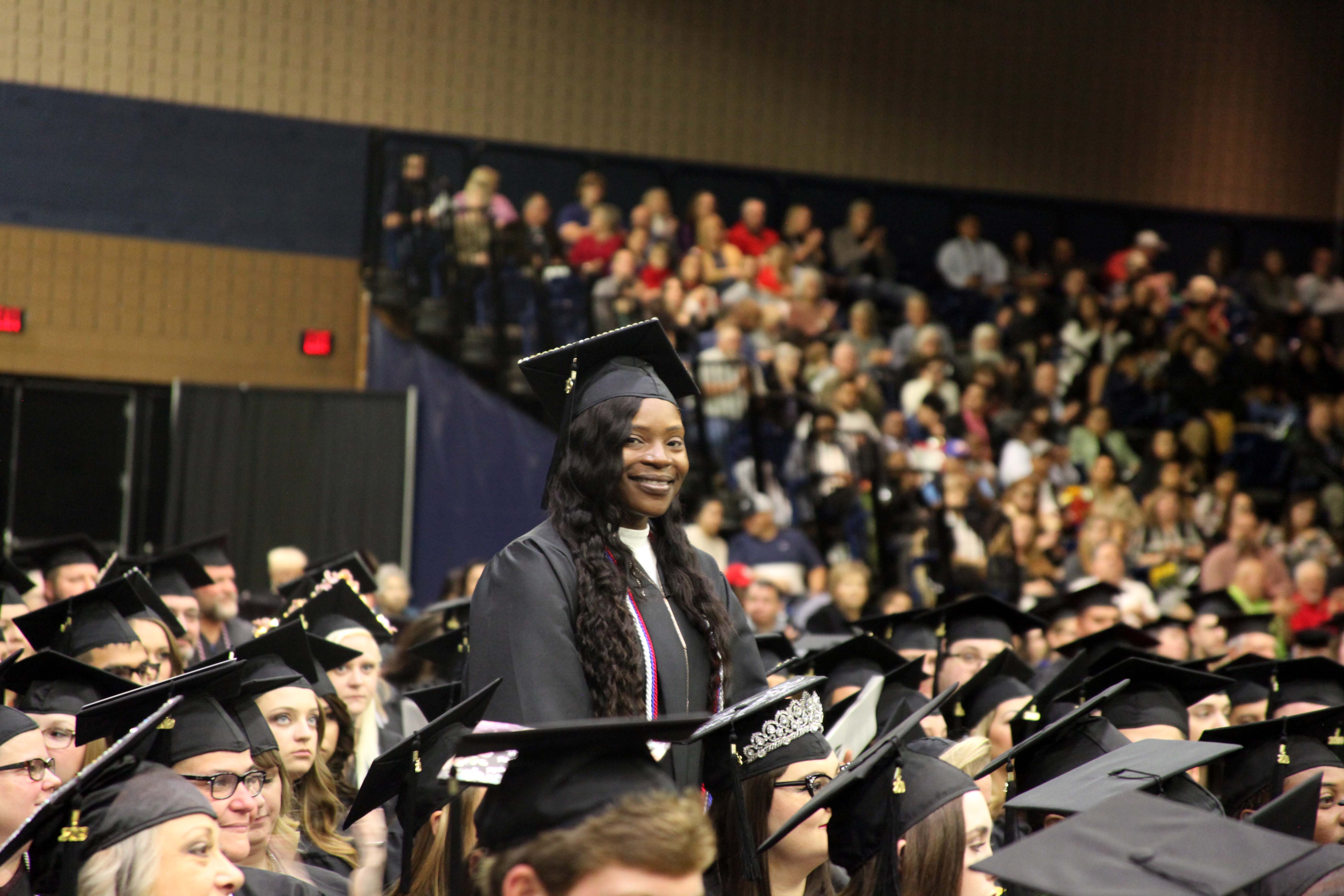 GNTC Student Government Association (SGA) President Jaweah Hamilton stands during the Fall 2019 Commencement Ceremony at the Dalton Convention Center. Hamilton was being recognized for her service in SGA and received an Associate of Applied Science Degree in Early Childhood Care and Education.