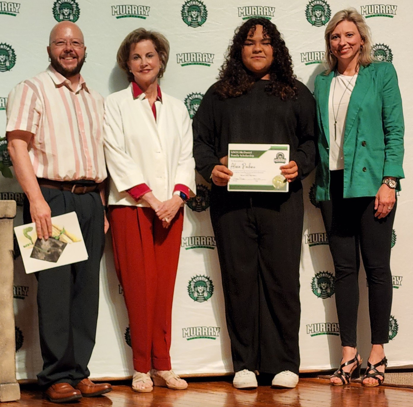 (From left) David McDaniel, GNTC Foundation Board Chair Sherrie Patterson, scholarship recipient Alexa Pacheco and Murray County High School Principal Andrea Morrow pose for the first award of the McDaniel Family Scholarship.