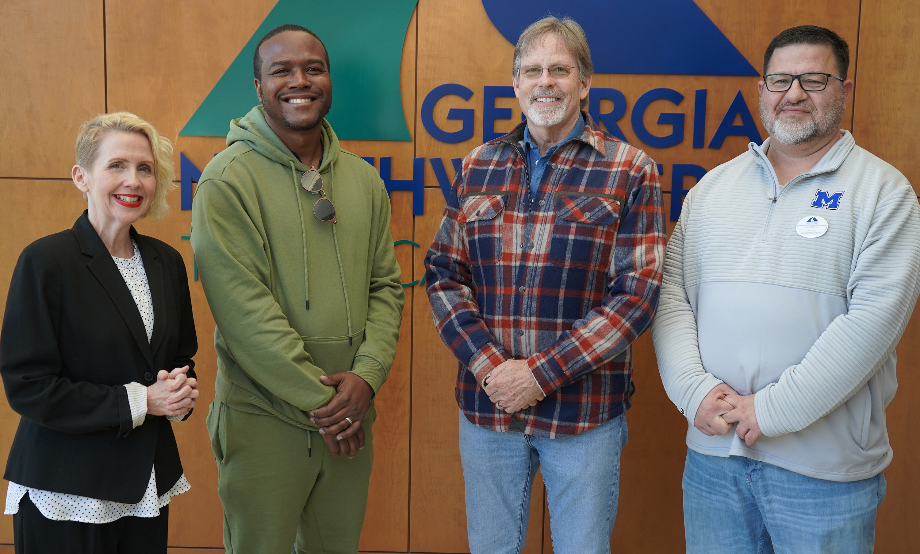 (From left) Lauretta Hannon, GNTC executive director of Institutional Advancement and executive director of the GNTC Foundation; GNTC student Darryl Gibbons Jr.; David Perry, president and owner of North Georgia Equipment Heating and Air Conditioning (NGE); and Chad Wheat, program director and instructor of Air Conditioning Technology, celebrate Gibbons’ receipt of the NGE Scholarship.