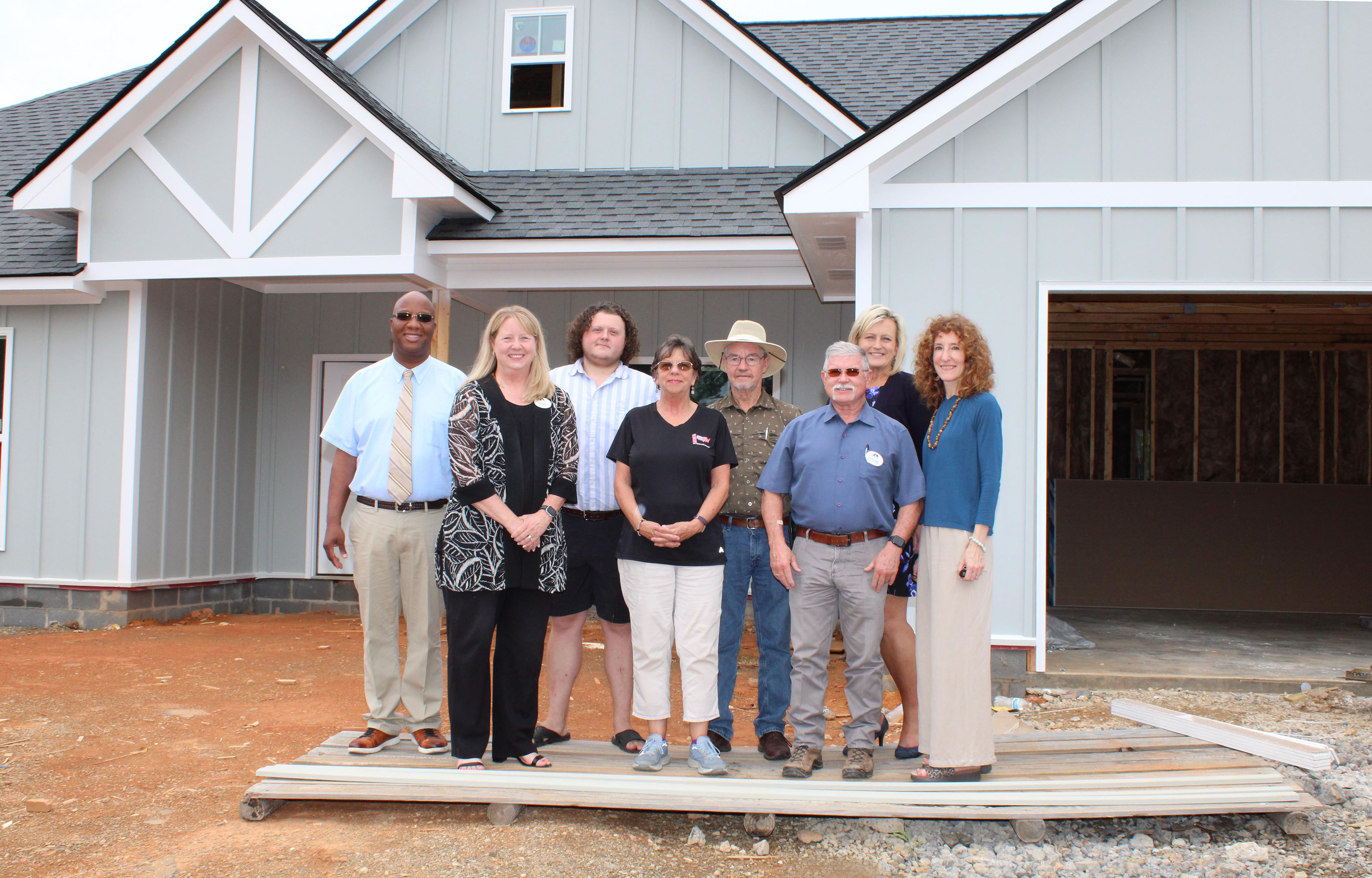 (From left, front row) Dr. Heidi Popham, GNTC president; Bonnie Thomas, City Electric Supply; Phil Burkhalter, Phillip Burkhalter Builders; and Sarah Egerer, GNTC Foundation administrator; (back row) Ethron “Carl” Crawford, Rome Home Builders Association Scholarship recipient; Grant Payne, Rome Home Builders Association Scholarship recipient; Sammy Bartley, Sammy Bartley Properties; and Connie Mathis, chief financial officer of River City Bank and executive officer of the Rome Home Builders Association. 