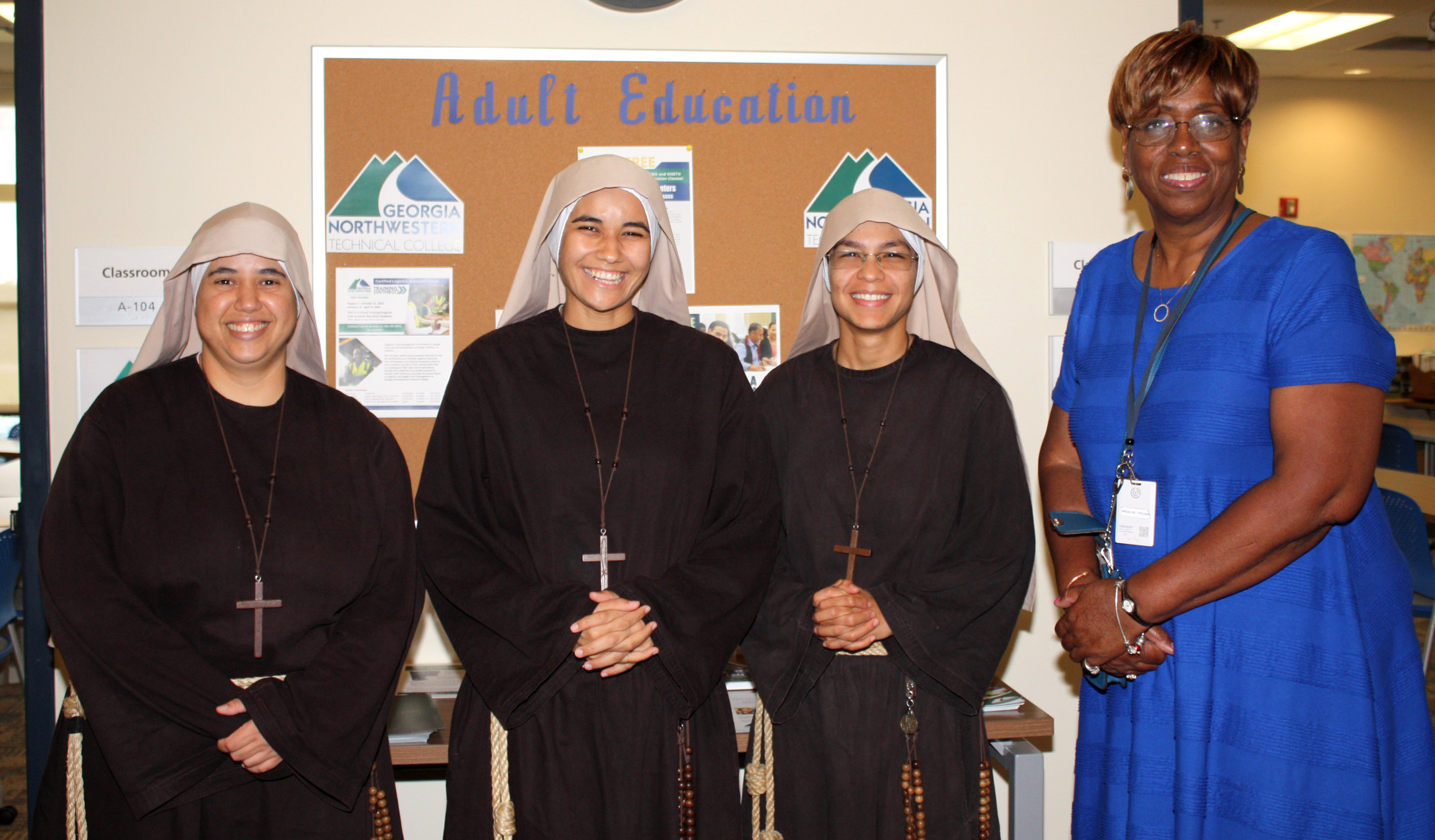 (From left) Sisters Antonella, Neriah and Bernada of the Sisters Poor of Jesus Christ take English as a Second Language classes at GNTC with Adult Education instructor Angela Freeman. 