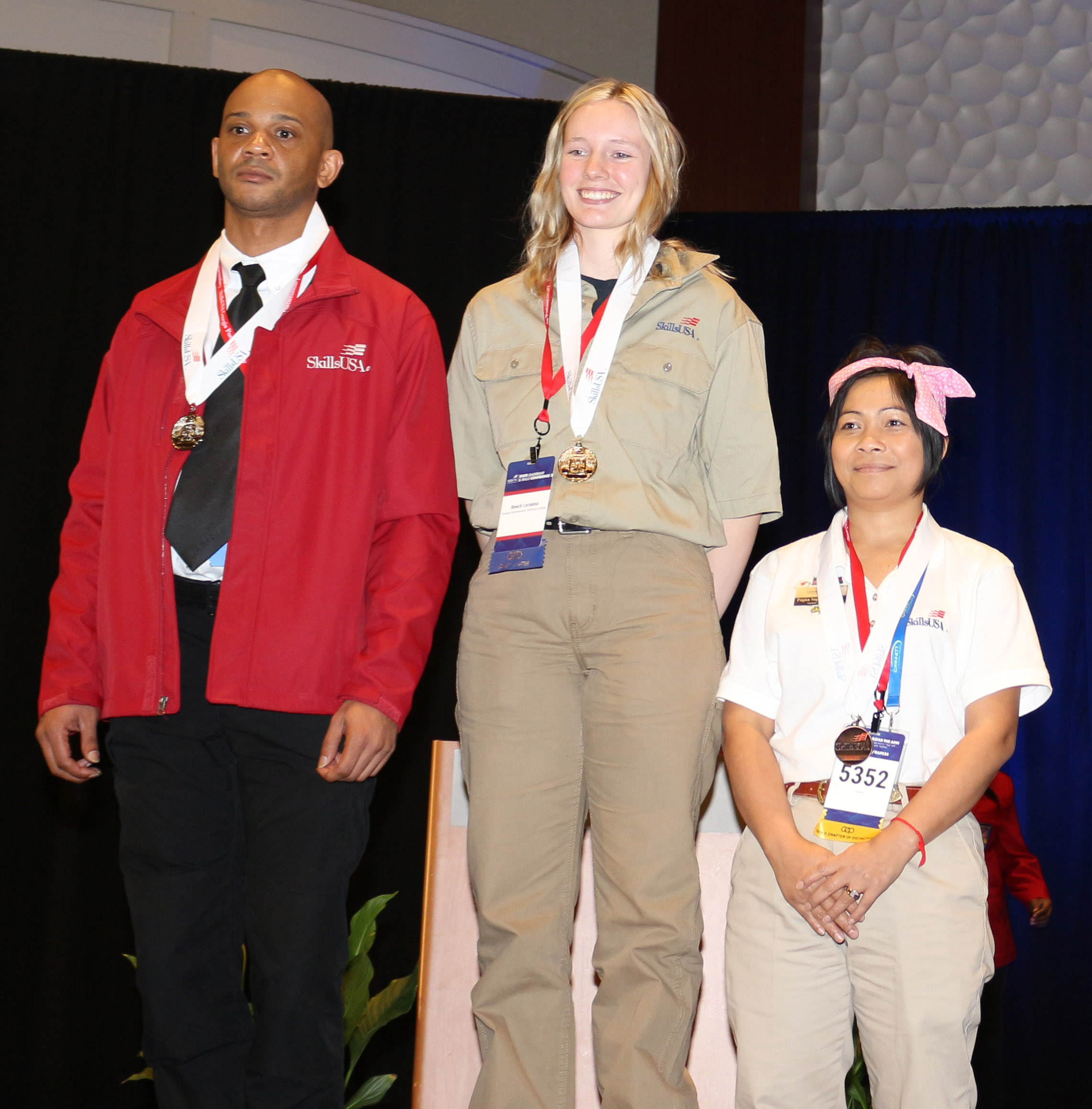 Lorianna Beech (center) receives the gold medal in Carpentry and will represent GNTC and the State of Georgia in the national contest June 17-21 in Atlanta.