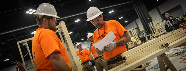 Georgia Northwestern Technical College’s 2016 SkillsUSA TeamWorks members Bo Dooley, left, returns for a chance to take home the national title in 2017. Also shown in this picture from the 2016 state competition in Atlanta, Georgia is 2016 team member Burt Burns. In the background, from left, is Tanner Boyd and Barry Arrington. Arrington will also be returning for the 2017 competitions